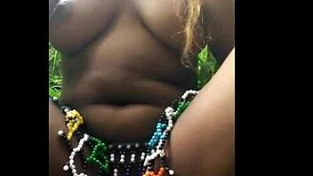 African model pleasures herself outdoors in the woods