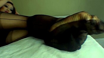 jade vixen peels off black nylon stockings