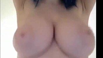 Blue haired 18yo shows off her huge breasts on webcam