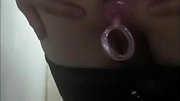 Stunning crossdresser indulges in self-pleasure with anal play