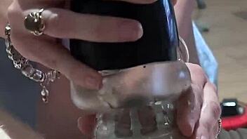 Locked away and stimulated: A caged penis teased with a vibrator in a sleeve