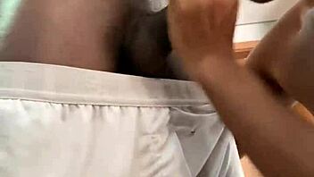 African-American men engaging in oral pleasure