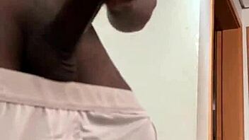 African-American men engaging in oral pleasure