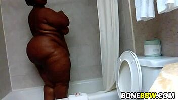 My big ass black BBW shines in the shower