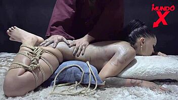 shibari enjoys being tied up while they cum in her mouth