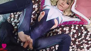 Miles Morales, a seductive Spider-Man from an alternate universe, passionately engages in sexual activity with Gwen Stacy, removing her clothes and filling her mouth with his ejaculation