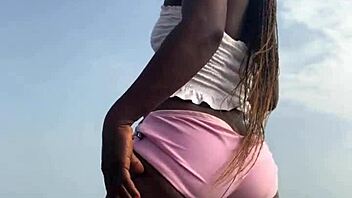 crazy bitch twerks hard in sexy clothes on outdoor beach with lesbian vibes