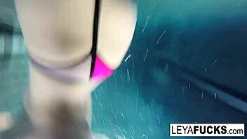 leya and lynn dive into steamy lesbian fun by the pool.