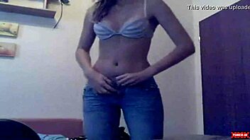 Watch teen undress on webcam striptease