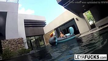 leya and lynn dive into steamy lesbian fun by the pool.