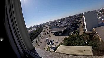 naked in hotel window feeling exposed and horny