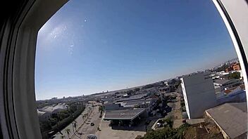 naked in hotel window feeling exposed and horny