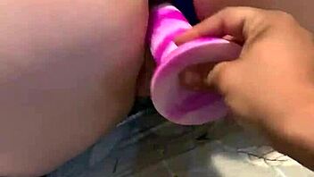 Ruby rouge plays with buttplug and dildo