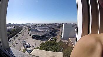 naked in hotel window feeling exposed and horny