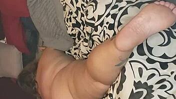 gaping her pussy with a pink dildo