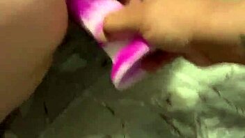 Ruby rouge plays with buttplug and dildo