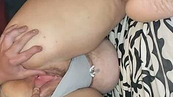 gaping her pussy with a pink dildo