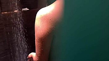 The mexican woman with long hair enjoys spending time with her neighbor when her husband is at the office