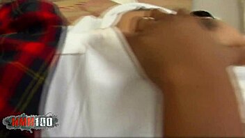 Two adorable African American college girls pleasure a large African American shaft together