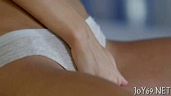 Young girl stimulates her moist vagina to achieve orgasm