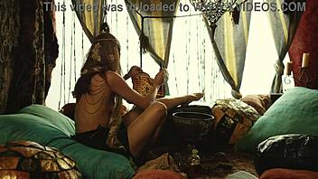 A young woman indulges in solo pleasure in a woodland tent
