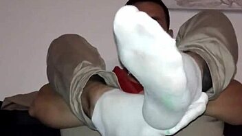 Sensual foot play in gay BDSM video