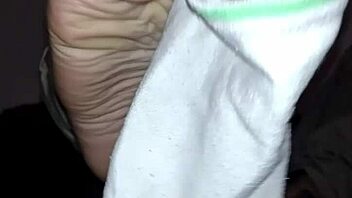 Sensual foot play in gay BDSM video