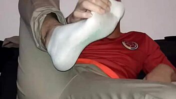 Sensual foot play in gay BDSM video