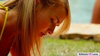 lesbian teen facesitting her blonde friend outdoors, kissing and licking in wild 69 action.