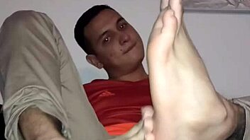 Sensual foot play in gay BDSM video