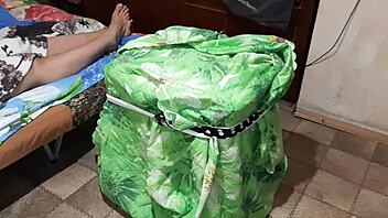 Beautiful girl emerges from box to lick pussy until climax.