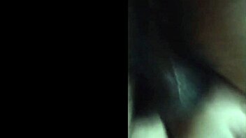 Aroused young woman pleasures herself with a new position