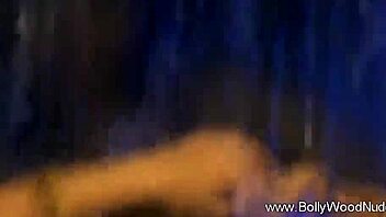 Indian beauty dances seductively with ripped clothing