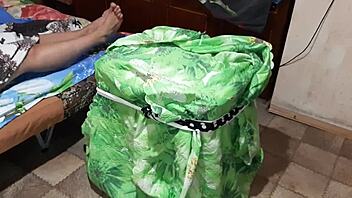 Beautiful girl emerges from box to lick pussy until climax.