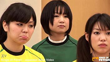 A group of Japanese girls learn from their coach in a sexy and cute video