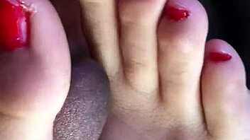 Friend gives footjob in car 😏