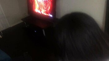 A sultry African-American woman performs oral sex
