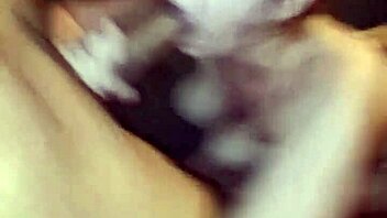 Two men pleasure a throbbing ass in a swingers' abode