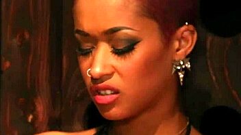 Black lesbian strapon penetrates submissive partner wearing stockings