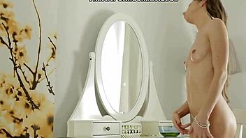 playing solo in glamorous lingerie, teasing herself