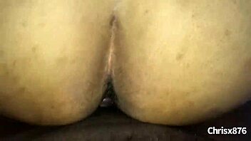 A Jamaican man fucks a black woman doggy style