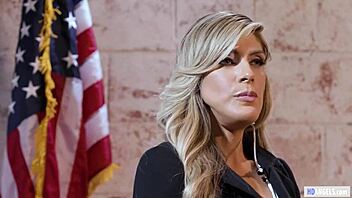 Hot Female Bodyguard Licks Mature Politician with Fake Tits in Wild Lesbian Action