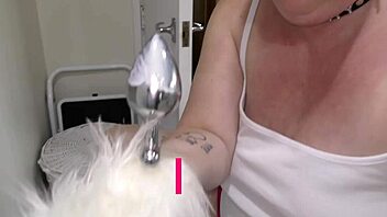 pin that tail, watch the bitch piss while sucking master