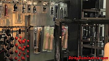 Busty dominatrix gets dildoed by submissive babe