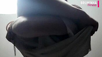 Brunette bombshell flaunts her assets - Big silicone breasts and a sexy ass