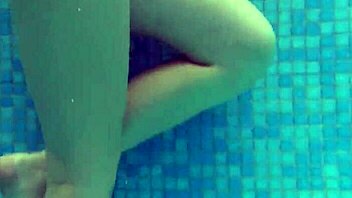 Lina Mercury, a Russian pornstar with big breasts, indulges in swimming pool fun