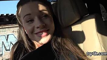 A young woman sensually performs oral sex on camera, spreading her legs and receiving penetration