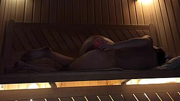 Girl with perfect figure pleasures herself in sauna with pink dildo, squirting hard