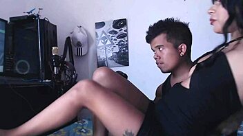 A midget indulges in video games as his stepsister becomes aroused and performs oral sex on him