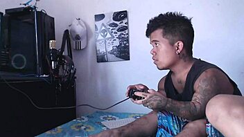 A midget indulges in video games as his stepsister becomes aroused and performs oral sex on him